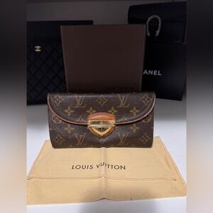 LOUIS VUITTON
Monogram Canvas Eugenie Wallet USED